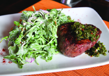 Grass-fed baseball steak with organic arugula.