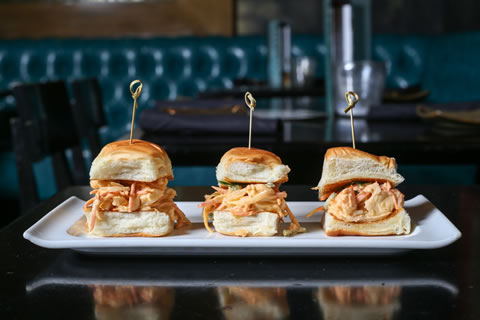 Pickled jalapeno is sprinkled on lobster roll sliders at Starfish.