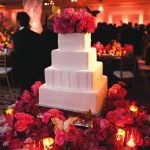 ULTIMATE CAKE_Four-Tier Textured Cake with Roses and Candles_Madan-Ajmera Wedding_090510_St. Regis Monarch Beach_Cake by St. Regis_Photograph by John Solano Photography