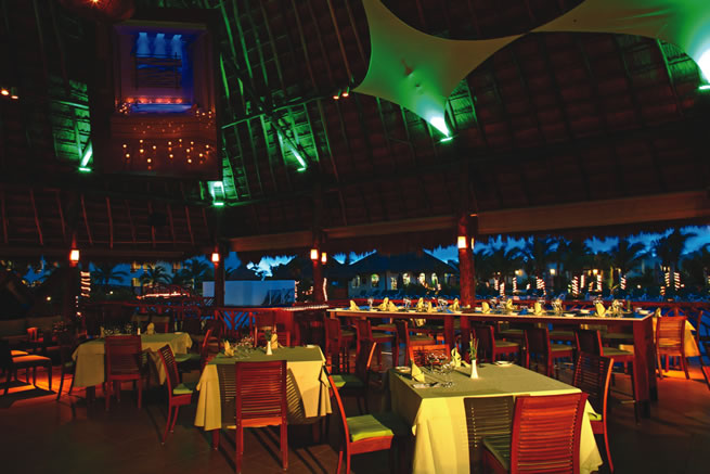 El Dorado Royale, a Spa Resort boasts a culinary theater, where dishes are prepared in open-air kitchens. 