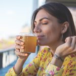 Woman Drinking kombucha