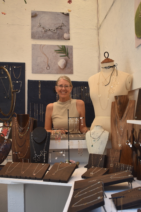 Beth Kukuk showcasing her pieces 