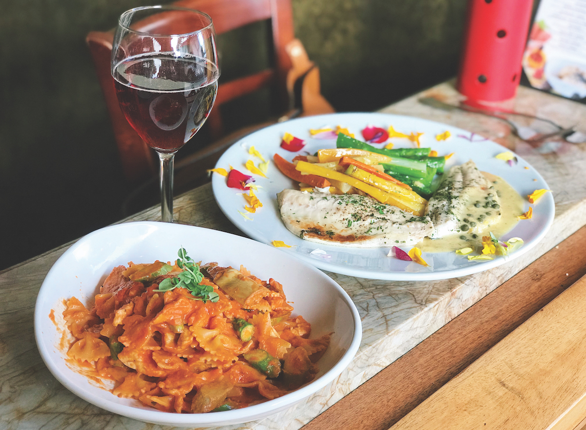 Local chef Alessandro Pirozzi’s  farfallina rosa (front) and branzino_credit Alessa by Chef Pirozzi